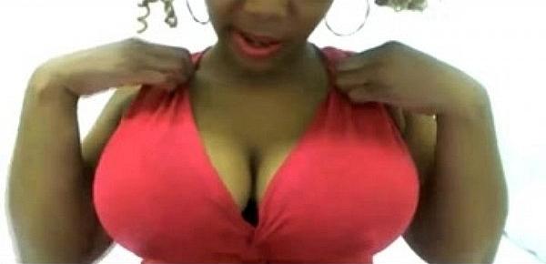  Mature ebony in pink dress sucks dildo on webcam  - more videos on dslwebcam.com